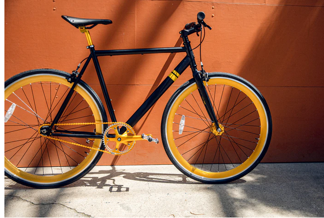 a bike leaning against a wall